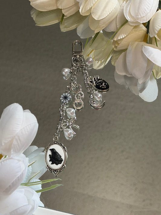 Raven E-Reader Charm